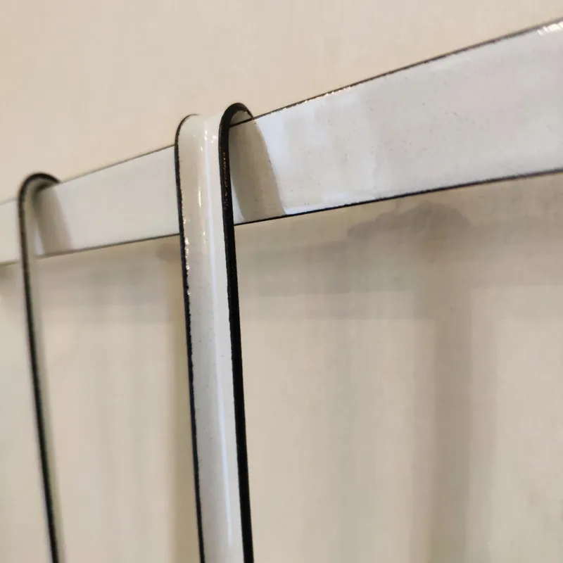 Louche/écumoire en émail blanc
